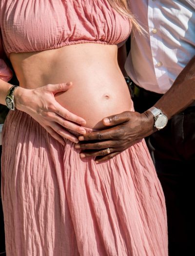 multiracial-couple-pregnant-holding-the-belly-2021-09-04-06-44-10-utc